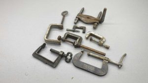 Seven Assorted Clamps Largest Is 60mm