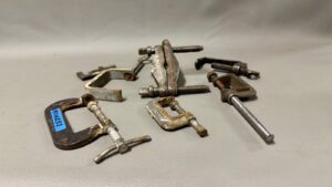 Seven Assorted Clamps Largest Is 60mm