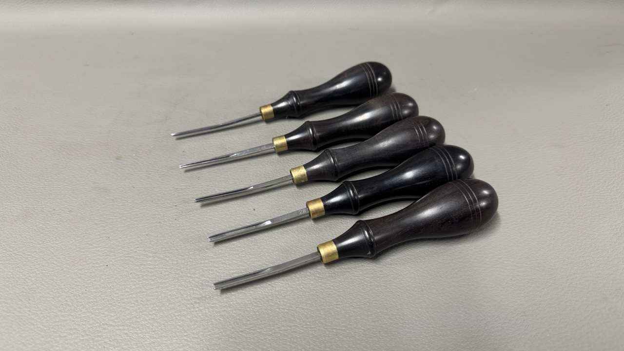 Five Leather Edgers With Ebony Handles
